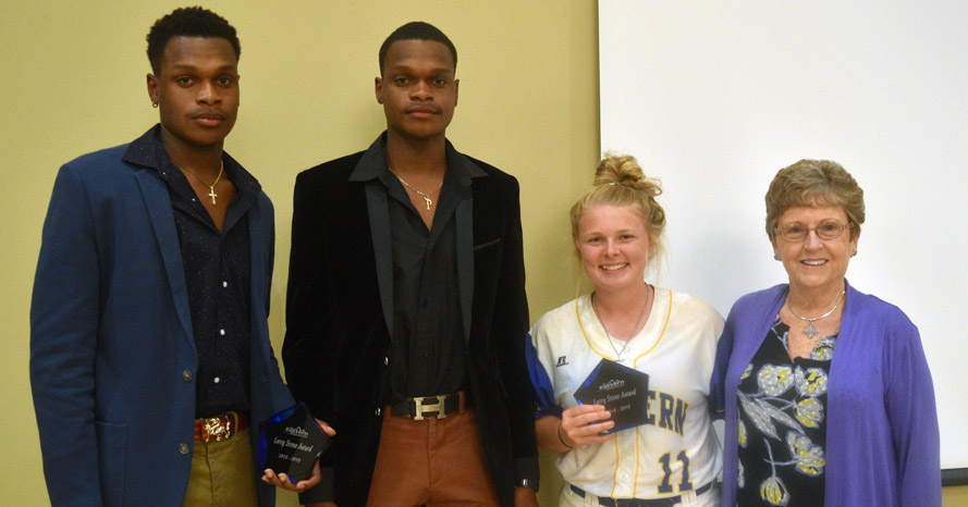 Devin Mosley, Tevin Mosley and Cailee Hendrick recently received the Larry Stone Award at the college’s 51st annual Larry Stone Athletics Awards Banquet.